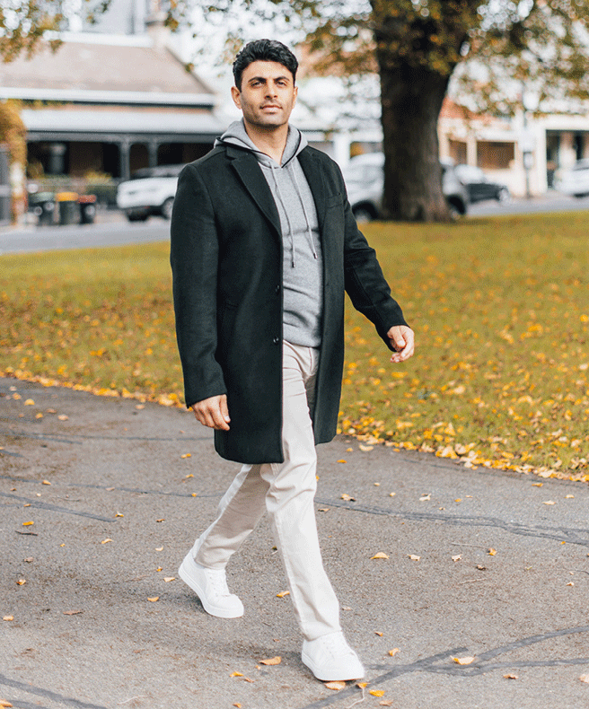 Amir Manoly wearing POLITIX outfit featuring the dark green Aslan Epsom Coat Amir Manoly wearing POLITIX outfit featuring the dark green Aslan Epsom Coat