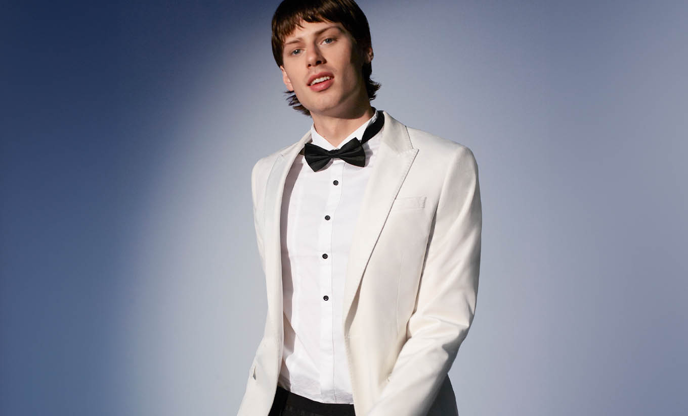 Male wearing tailored white jacket