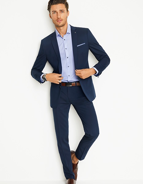 blue suit tan shirt